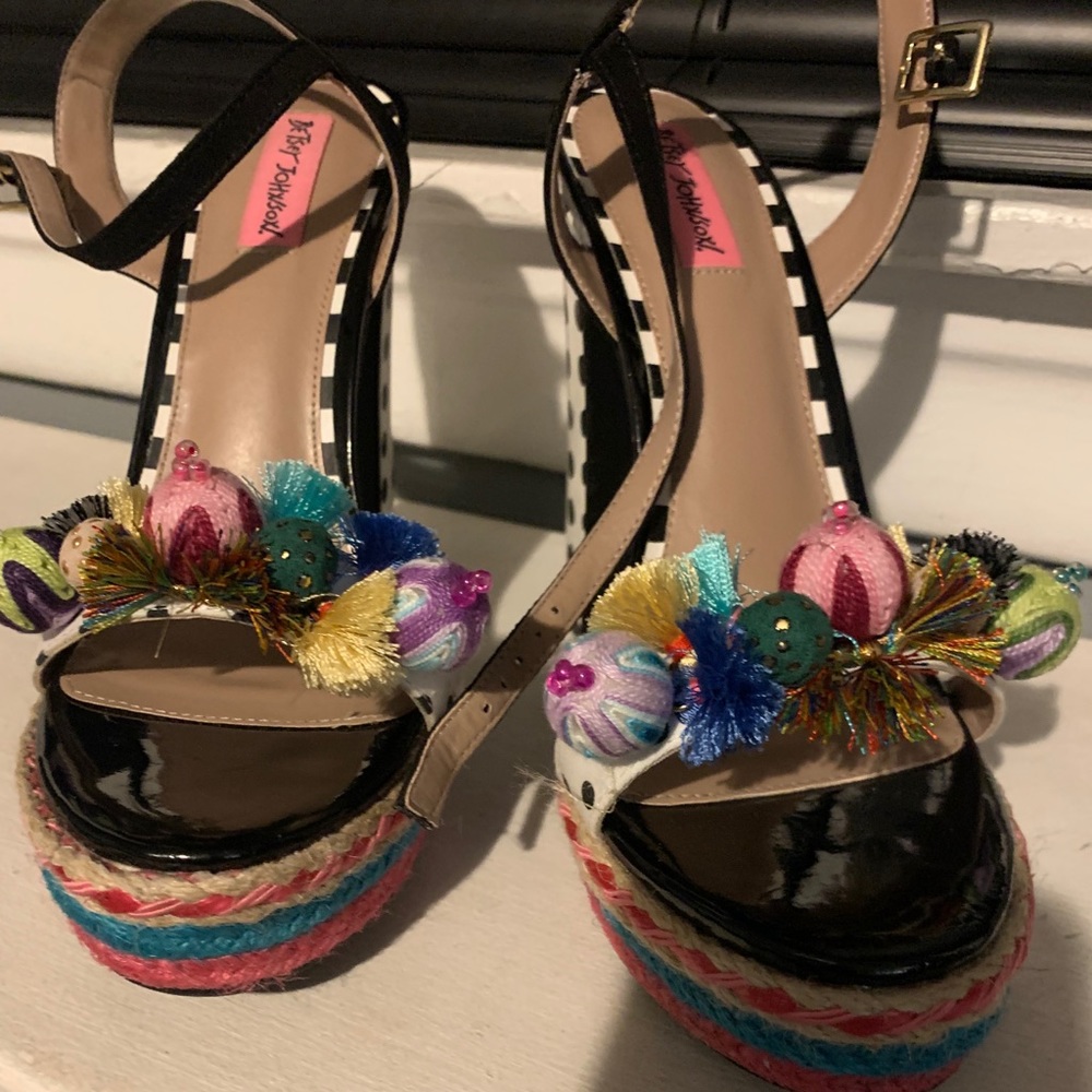 Betsey Johnson polka dot heels 
1.25 inches